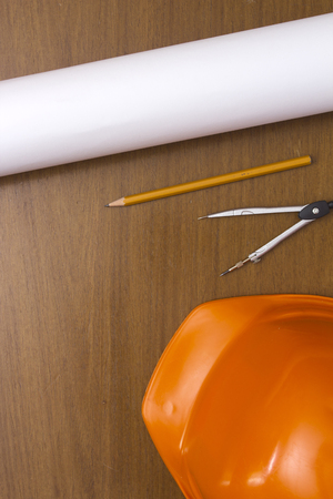 Engineer Construction Accessories - plastic helmet, compass and pencil drawings bundle.