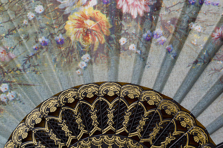 Spanish fan with authentic pattern, flowers on the fan.の写真素材