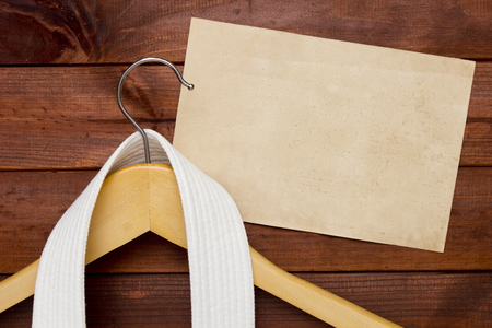White Belt Karate on a clothes hanger.の写真素材