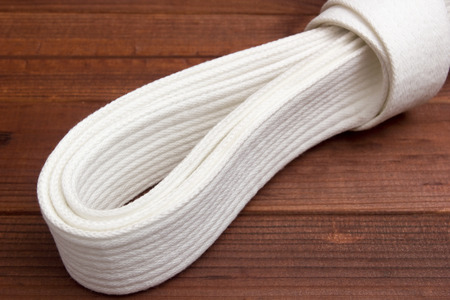 Belt - clothing accessory for karate lessons in martial arts.の写真素材