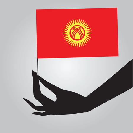Flag of Kyrgyzstan in a female hand. Vector illustration.のイラスト素材