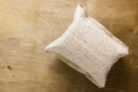 Blank Sack Bag on wooden background