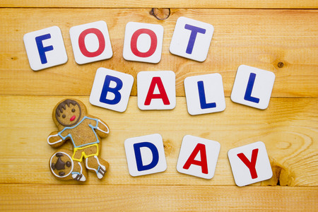 International Day of football creative greetings with a dough biscuit.の写真素材