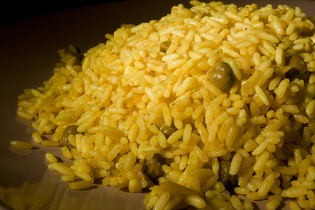 Vegetable risotto closeup on a wooden plateの写真素材