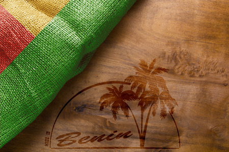 Flag of Benin and imprint on wooden Made in Beninの写真素材