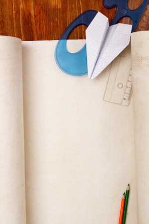 Concept of the workplace for the aviation designer on a wooden backgroundの写真素材