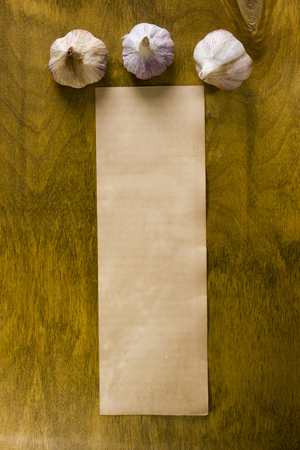 fresh garlic bunches on vintage wooden surfaceの写真素材