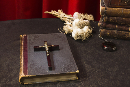 Set to fight the vampires on a table covered with a black brocadeの写真素材