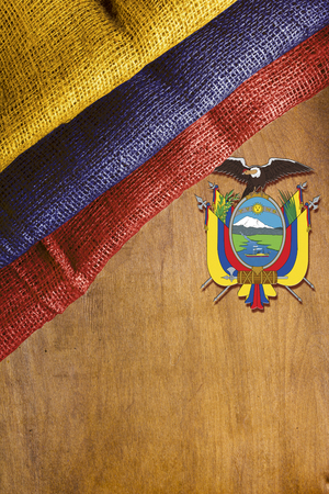 The state flag of Ecuador on a wooden backgroundの写真素材