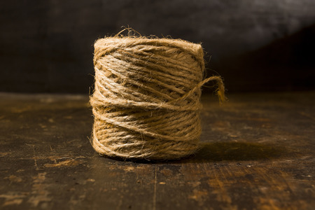 Ball or reel of coarse brown twine