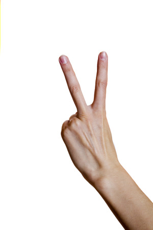 Hand of a young woman on a white isolated backgroundの写真素材