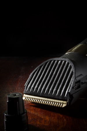Electric shaver on wooden table close upの写真素材