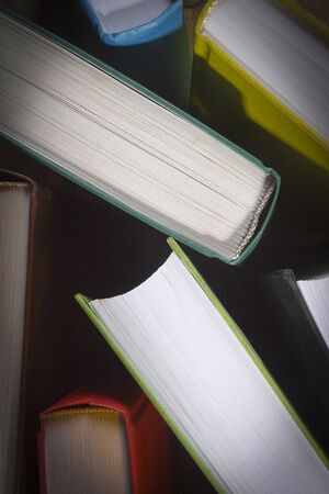 Background of standing books top view close-up