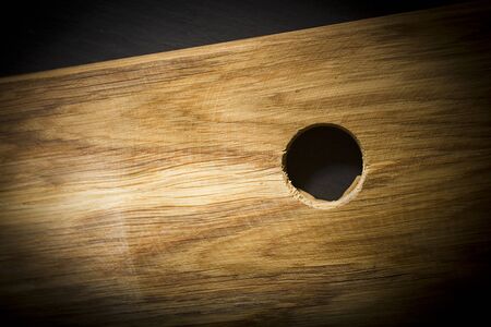 Cutting board close-up in the form of a wooden texture backgroundの写真素材