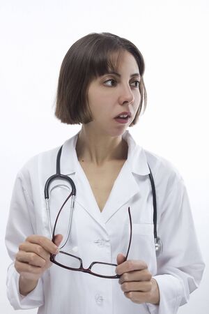 Young female doctor on white isolated backgroundの写真素材