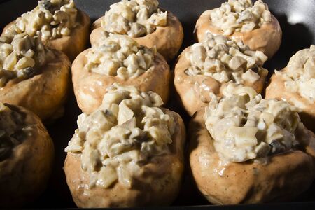 Homemade sausages stuffed with mushrooms with cheese and eggsの写真素材