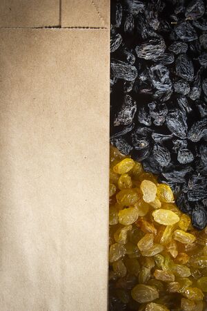 Raisins light and dark as a backgroundの写真素材