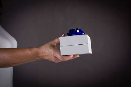 Gift in the hands of a woman