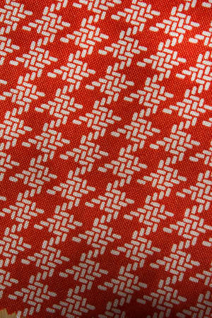 Fabric with geometric pattern as a backgroundの写真素材