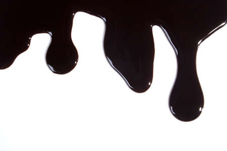 Melted chocolate isolated on white background, top viewの写真素材