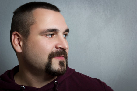 Portrait of a young man with a beardの写真素材