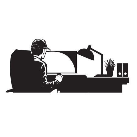 Programmer at a computer with a large monitor and office items on the tableのイラスト素材
