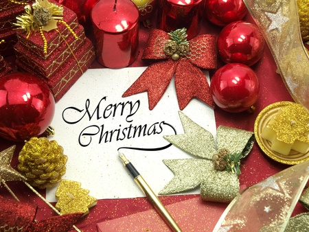 Christmas card with decorative red ornamentsの写真素材