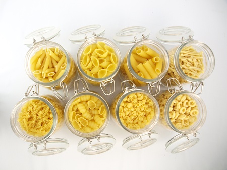 Glass jar filled with various pastaの写真素材