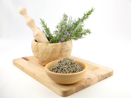 Lavender in wooden mortar with pestleの写真素材