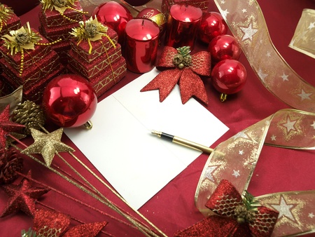 Christmas card with decorative red ornamentsの写真素材