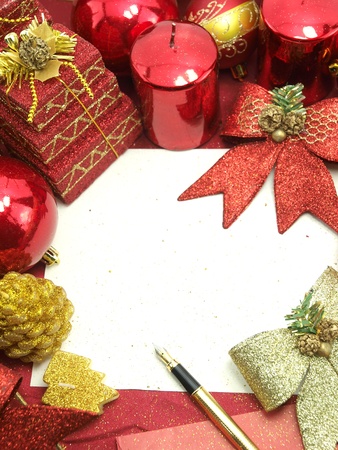 Christmas card with decorative red ornamentsの写真素材