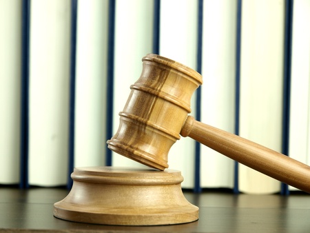 Judges Gavel and stack of legal books の写真素材