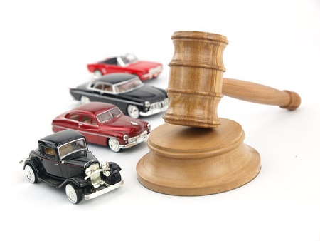 Gavel auction with antiques cars の写真素材