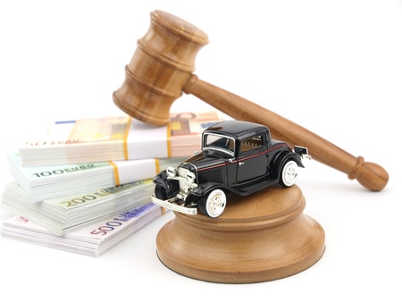 Gavel auction with antique car and moneyの写真素材