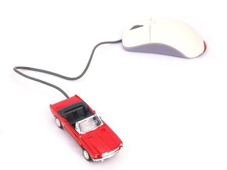 A car connected to a computer mouse の写真素材