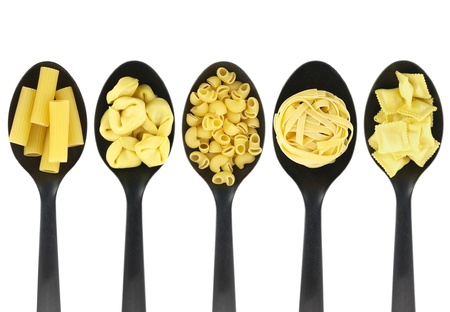 Misc raw pasta over spoons の写真素材