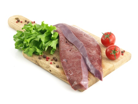 Fresh raw liver on cutting board isolated on white backgroundの写真素材