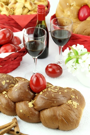 A traditional sweet brioche bread, called tsoureki, decorated with red eggs (Greek recipe) の写真素材