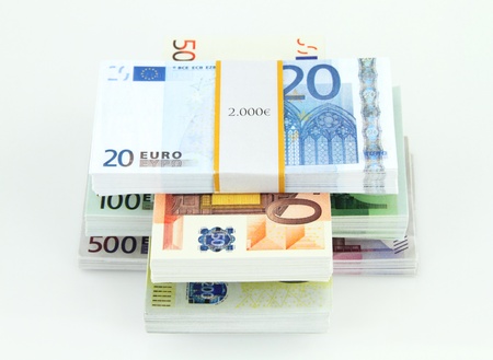  Stacks of Euros on white backgroundの写真素材