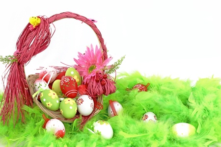 Colorful Easter eggs in a basket の写真素材