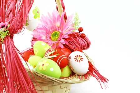 Colorful Easter eggs in a basket の写真素材