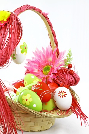 Colorful Easter eggs in a basket の写真素材
