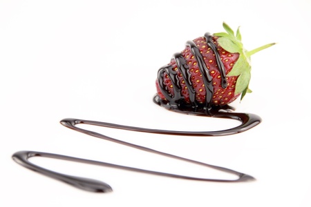 Strawberry  and sauce of black chocolate の写真素材
