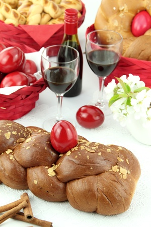 A traditional sweet brioche bread, called tsoureki, decorated with red eggs (Greek recipe) の写真素材