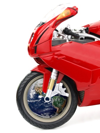 Motorcycle with globe on the wheelの写真素材