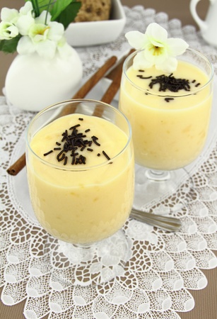 Glass with sweet vanilla pudding dessertの写真素材
