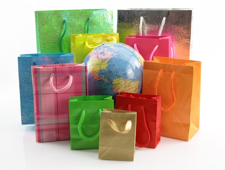 Shopping bags around of the world globeの写真素材