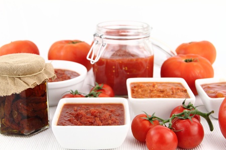 Tomato sauce and fresh tomatoesの写真素材