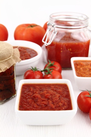 Tomato sauce and fresh tomatoesの写真素材
