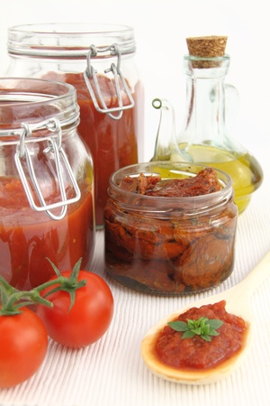 Tomato sauce and fresh tomatoesの写真素材